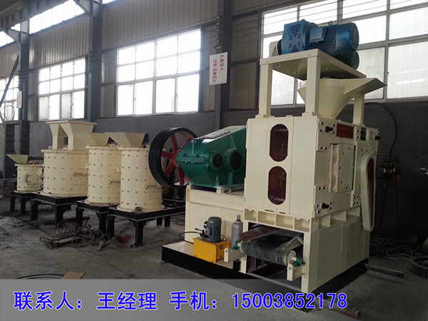 螺旋預(yù)壓裝置是干粉壓球機的必備裝置